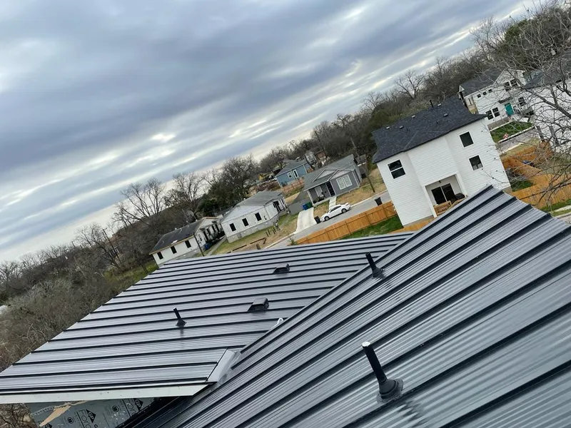 Standing seam metal roof panels with vents for Skylight Repair in Huber Heights